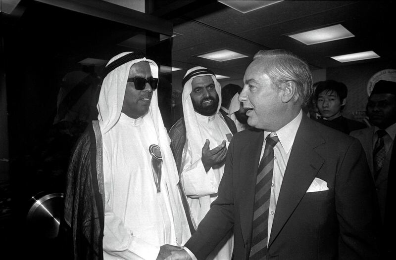 Chairman of the Bank of Oman Mr Sheikh Saif Al-Ghurair (left) shaking hands with Chairman of the Hongkong and Shanghai Banking Corporation Limited Mr Michael Sandberg during the opening reception of the Bank of Oman's representative office in Hong Kong. 20SEP78 (Photo by C. Y. Yu/South China Morning Post via Getty Images)