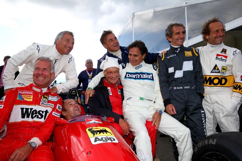SPIELBERG, AUSTRIA - JUNE 20:  (L-R) Christian Danner, Riccardo Patrese, Gerhard Berger, Niki Lauda, Jean Alesi, Nelson Piquet, Pierluigi Martini and Alain Prost pose on track after qualifying for the Formula One Grand Prix of Austria at Red Bull Ring on June 20, 2015 in Spielberg, Austria.  (Photo by Mark Thompson/Getty Images)