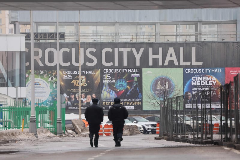 Russian law enforcement officers at the site of a deadly gun attack on the Crocus City Hall. AFP