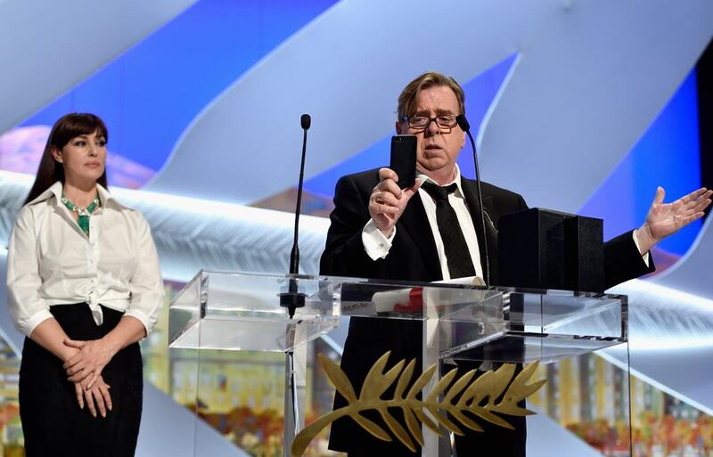 Timothy Spall, winner of the Best Actor Prize, received his award from actress Monica Bellucci.