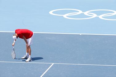 Daniil Medvedev, of the Russian Olympic Committee, reacts during his men's singles third round tennis match against Fabio Fognini, of Italy, at the Tokyo 2020 Olympic Games, at the Ariake Tennis Park, in Tokyo, Japan, 28 July 2021.   EPA / RUNGROJ YONGRIT