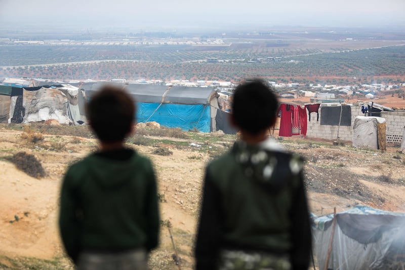 Children at a camp for internally displaced Syrians in the Jabal Bersaya area, near the opposition-held Turkey border crossing of Bab Al Salama northern Aleppo. AFP