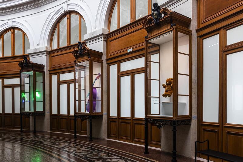 Various pieces by the artist Bertand Lavier in display cases on the ground floor of the Bourse de Commerce. Bloomberg