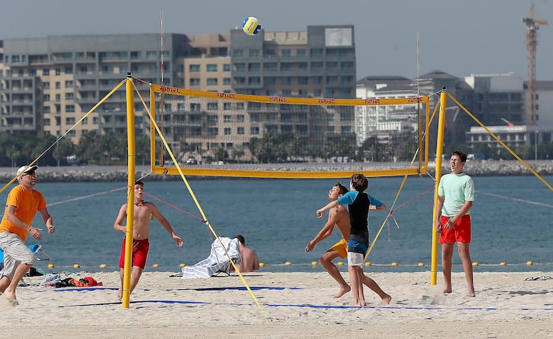 DUBAI , UNITED ARAB EMIRATES , December 31 ��� 2018 :- People enjoying at the open beach near Palm Jumeirah in Dubai. ( Pawan Singh / The National ) For News Standalone