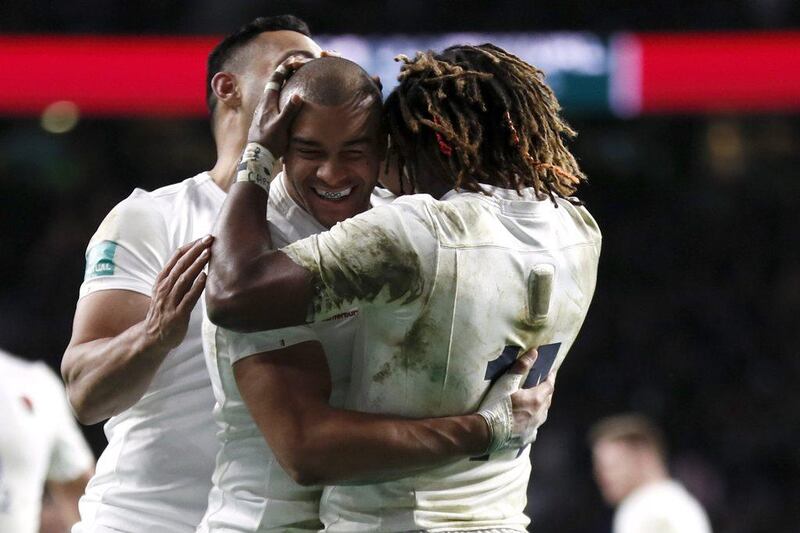 England's Jonathan Joseph celebrates scoring their fourth try with Marland Yarde. Stefan Wermuth /  Reuters / December 3, 2016