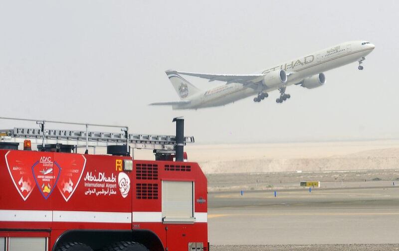 An Etihad Airways aircraft takes off from Abu Dhabi International Airport. Ben Job / Reuters