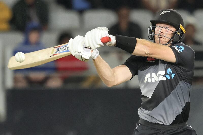 New Zealand's Martin Guptill plays a shot during the third Twenty20 cricket match between New Zealand and Bangladesh in Auckland on April 1, 2021. (Photo by MICHAEL BRADLEY / AFP)