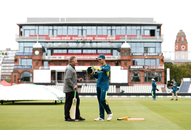 MANCHESTER, ENGLAND - SEPTEMBER 03: Former Australian Wicketkeeper Ian Healy speaks with Tim Paine of Australia during the Australia Nets Session at Emirates Old Trafford on September 03, 2019 in Manchester, England. (Photo by Ryan Pierse/Getty Images)