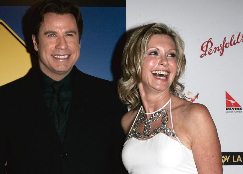 Travolta presented Newton-John with a Lifetime Achievement award at the Penfolds Icons gala dinner in 2006. AP