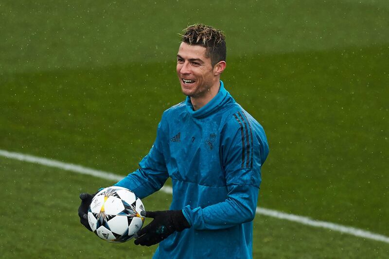 MADRID, SPAIN - APRIL 10: Cristiano Ronaldo of Real Madrid CF jokes with his team mates during a training session ahead of their UEFA Champions LEague quarter final second leg match against Juventus at Valdebebas training ground on April 10, 2018 in Madrid, Spain. (Photo by Gonzalo Arroyo Moreno/Getty Images)