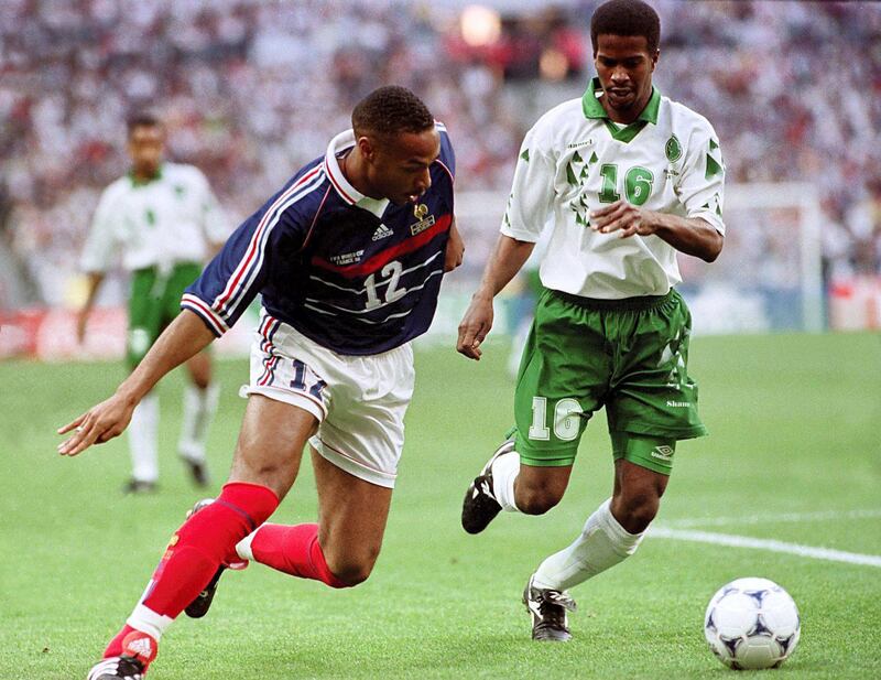 Thierry Henry of France (left) tries to get round Khamis Al Owairan of Saudi Arabia (right)  (Photo by Michael Steele/EMPICS via Getty Images)
