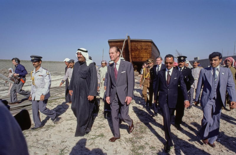 British Royal Prince Philip, Duke of Edinburgh with unspecified dignitaries during a visit to a dhow building yard in Kuwait, February 1979. The occasion was part of a Royal Tour of the Gulf States, between 12th February and 1st March 1979. (Photo by Tim Graham Photo Library via Getty Images)