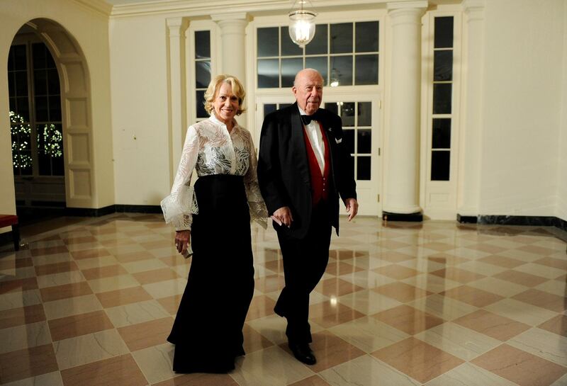 George Shultz and his wife Charlotte arrive at the White House for a state dinner hosted by President Barack Obama and first lady Michelle Obama for Chinese President Hu Jintao on January 19, 2011. Reuters