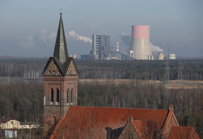 JAWORZNO, POLAND - NOVEMBER 29: A village church stands near the Jaworzno II coal-fired power station in the coal-heavy region of Silesia on November 29, 2018 near Jaworzno, Poland. The United Nations COP 24 climate conference is due to begin on December 2 in nearby Katowice. (Photo by Sean Gallup/Getty Images)
