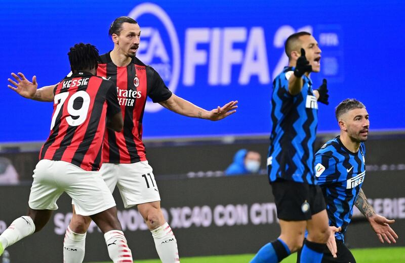 AC Milan's Zlatan Ibrahimovic after his challenge on Inter defender Aleksandar Kolarov that earned him a second yellow card. AFP