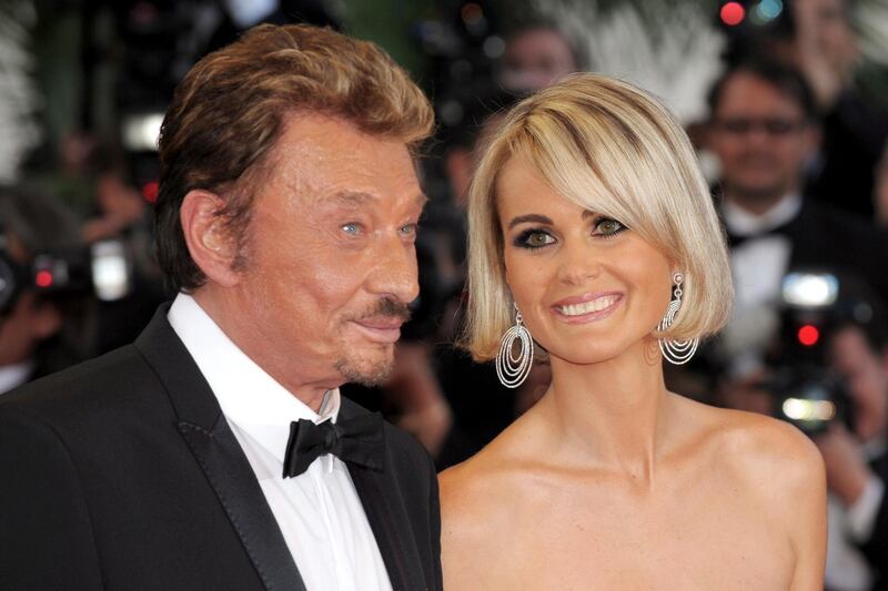 epa06370485 (FILE) A file picture dated 17 May 2009 shows French singer Johnny Hallyday (L) with his wife Laetitia arriving for the premiere of 'Vengeance' during the 62nd annual Cannes film festival in Cannes, France (reissued 06 December 2017). According to reports on 06 December 2017, French singer and actor Johnny Hallyday died at the age of 74.