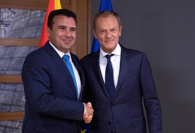 epa07925877 European Council President Donald Tusk (R), welcomes North Macedonia's Prime Minister Zoran Zaev (L), prior to a meeting at the European Council building in Brussels, Belgium, 16 October 2019.  EPA/VIRGINIA MAYO / POOL