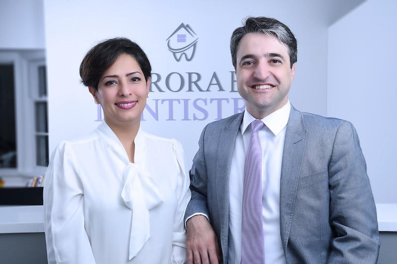 A victim of the Ukraine International Airlines crash in Iran, Dr Parisa Eghbalian poses with her husband Dr Hamed Esmaeilion at their dentistry practice in Aurora, Ontario, Canada.  Reuters