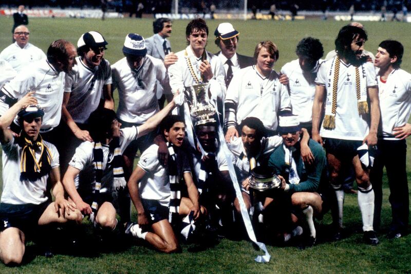 The victorious Tottenham Hotspur team celebrate with the FA Cup trophy  (Photo by Peter Robinson/EMPICS via Getty Images)
