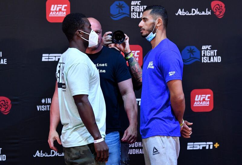 ABU DHABI, UNITED ARAB EMIRATES - JULY 14: (L-R) Opponents Abdul Razak Alhassan of Ghana and Mounir Lazzez of Tunisia face off during the UFC Fight Night weigh-in inside Flash Forum on UFC Fight Island on July 14, 2020 in Yas Island, Abu Dhabi, United Arab Emirates. (Photo by Jeff Bottari/Zuffa LLC via Getty Images)