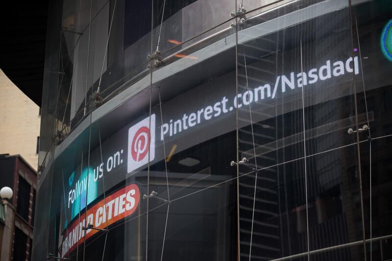 A monitor displays Pinterest Inc. signage outside the Nasdaq MarketSite in the Times Square neighborhood of New York, U.S., on Monday, April 8, 2019. U.S. stocks pared losses as investors awaited signs of progress in the trade war with China ahead of the latest corporate earnings season. Photographer: Michael Nagle/Bloomberg 