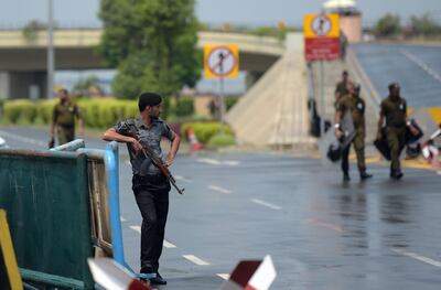 Pakistani security personnel patrol outside the Alama Iqbal International Airport ahead of the arrival of ousted prime minister Nawaz Sharif from London, in Lahore on July 13, 2018. Pakistan authorities locked down parts of Lahore on July 13 for the return from London of former premier Nawaz Sharif, who faces possible arrest and a 10-year prison sentence ahead of already tense elections his party insists are being rigged. / AFP / AAMIR QURESHI
