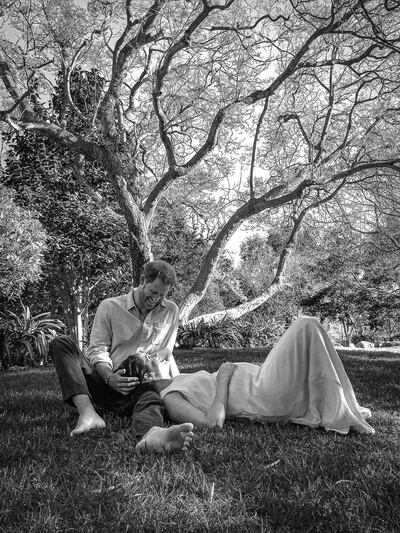 Britain's Prince Harry and his wife Meghan, the Duke and Duchess of Sussex, are pictured in this undated handout photo supplied to Reuters, following an announcement that they are expecting their second child. Photo by Misan Harriman, Copyright owned by The Duke and Duchess of Sussex (copyright) 2021/Handout via REUTERS ATTENTION EDITORS - THIS IMAGE HAS BEEN SUPPLIED BY A THIRD PARTY. NO RESALE. NO ARCHIVE. EDITORIAL USE ONLY. NO NEW USES AFTER MARCH 15, 2021, 23:59:59