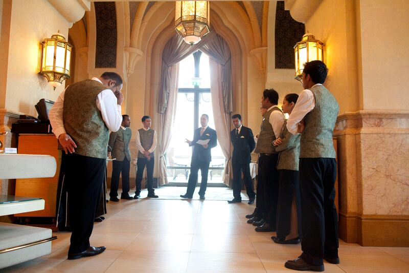 Abu Dhabi, United Arab Emirates, July 15, 2013:     Restraunt Manager at Vendome Ahmet Onay speaks to his staff prior to opening at Emirates Palace in Abu Dhabi on July 15, 2013. Christopher Pike / The National

Reporter: GILLIAN DUNCAN *** Local Caption ***  CP0715-emirates palace022.JPG