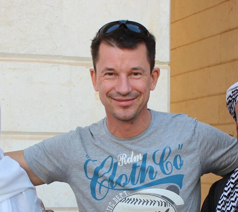 A handout photo taken in October 2012 and obtained courtesy of the Cantlie family shows British photojournalist John Cantlie at an undisclosed location in Syria. Cantlie was kidnapped together with one of the executed journalists, James Foley, in November 2012 in Syria. AFP PHOTO / COURTESY OF THE CANTLIE FAMILY
RESTRICTED TO EDITORIAL USE - MANDATORY CREDIT "AFP PHOTO / COURTESY OF THE CANTLIE FAMILY" - NO MARKETING NO ADVERTISING CAMPAIGNS - DISTRIBUTED AS A SERVICE TO CLIENTS (Photo by - / COURTESY OF THE CANTLIE FAMILY / AFP)