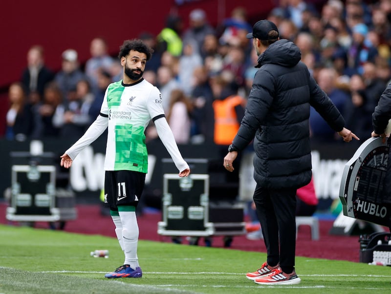 Liverpool's Mohamed Salah clashes with manager Jurgen Klopp. Reuters 