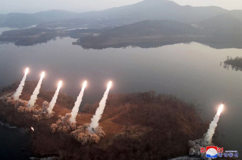 Missiles are fired by the Hwasong Artillery unit, responsible for operational missions of the Korean People's Army Western Front, at an undisclosed location in North Korea. AFP