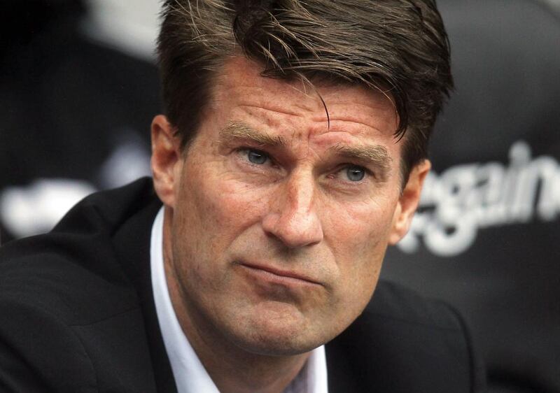 Michael Laudrup, the outgoing manager, was reportedly not on the best of terms with the Swansea City board since last summer. Ian Kington / AFP