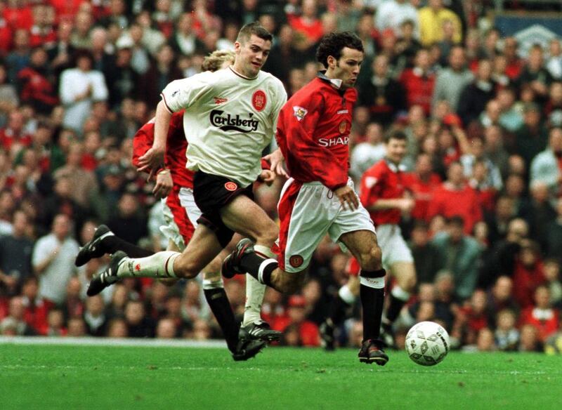 Giggs is pursued by Liverpool's Dominic Matteo. Photo: RTRUWT