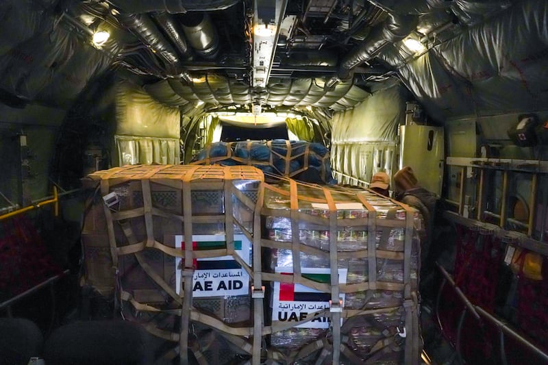 The aid supplied to Syria by the UAE includes food, in brown packaging, and tents in the blue packages