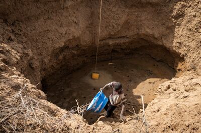 A makeshift water well, dug into a dried up river bed on the outskirts of the village of Madina Torobe in Senegal. AFP