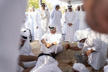 ABU DHABI, UNITED ARAB EMIRATES - October 01, 2019: HH Sheikh Mohamed bin Zayed Al Nahyan, Crown Prince of Abu Dhabi and Deputy Supreme Commander of the UAE Armed Forces (C), attends the burial of the late Suhail bin Mubarak Al Ketbi, at Al Bateen cemetery. Seen with HH Sheikh Hamdan bin Zayed Al Nahyan, Ruler’s Representative in Al Dhafra Region, HH Sheikh Hazza bin Zayed Al Nahyan, Vice Chairman of the Abu Dhabi Executive Council, HH Sheikh Diab bin Zayed Al Nahyan and HH Sheikh Mansour bin Zayed Al Nahyan, UAE Deputy Prime Minister and Minister of Presidential Affairs. ( Abdullah Al Junaibi ) ---