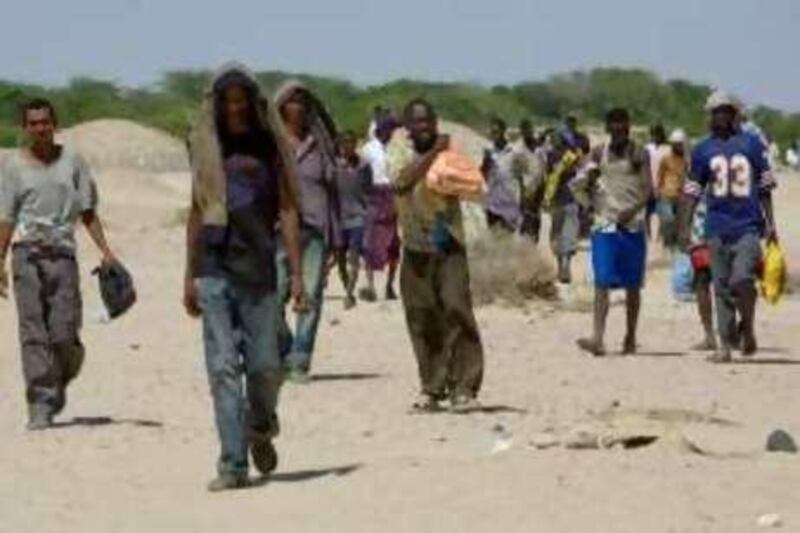 Caption Refugees who arrived on Yemen's shores hours earlier make their way 35 kilometers to the UN High Commission for Refugees reception center at Ahwar. Since January some 33,600 refugees, the majority from Somalia, some from Ethiopia, have reached Yemen, but at least 400 people have drowned. The number of asylum seekers who have made it to the Yemeni shores this year has doubled from last year.?

Evelyn Hockstein for The National *** Local Caption ***  IMG_9748-Edit-2.jpg