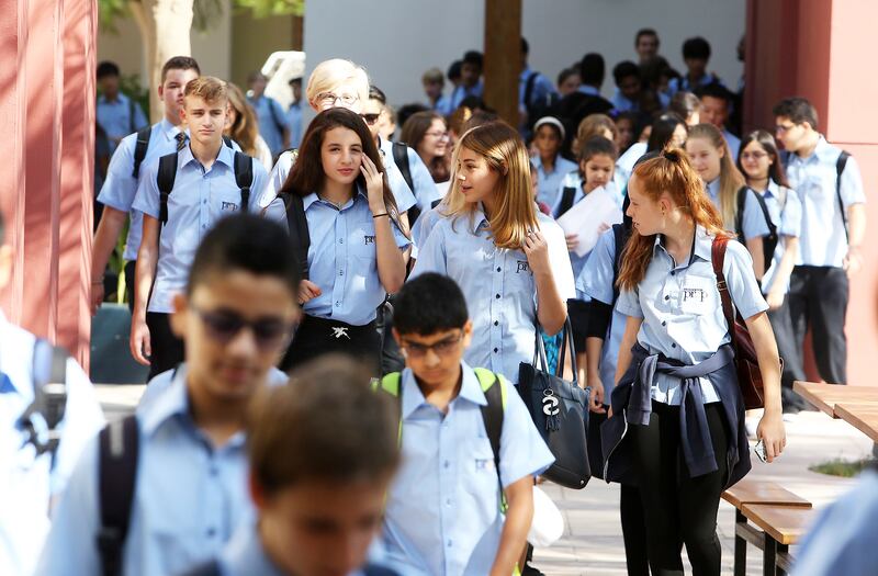 DUBAI , UNITED ARAB EMIRATES – Aug 28 , 2016 : Students going for the assembly  on the first day of school after the summer vacation at the Bradenton Preparatory Academy in Dubai Sports City in Dubai. ( Pawan Singh / The National ) For News. Story by Nadeem Hanif. ID No - 77443 *** Local Caption ***  PS2808- NEW SCHOOL YEAR01.jpg