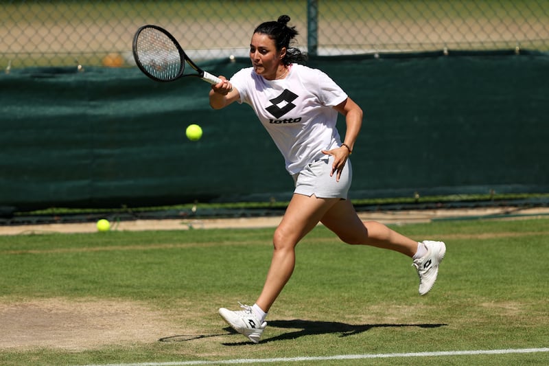 Ons Jabeur of Tunisia plays a forehand during a training session on the eve of the Wimbledon 2022 women's final at All England Lawn Tennis and Croquet Club on July 08, 2022 in London, England. Getty Images
