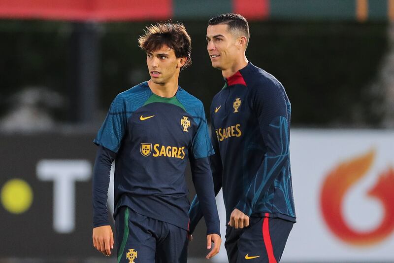 Cristiano Ronaldo, right, and fellow Portugal forward Joao Felix. EPA