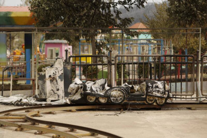 Charred fairground rides. Getty Images
