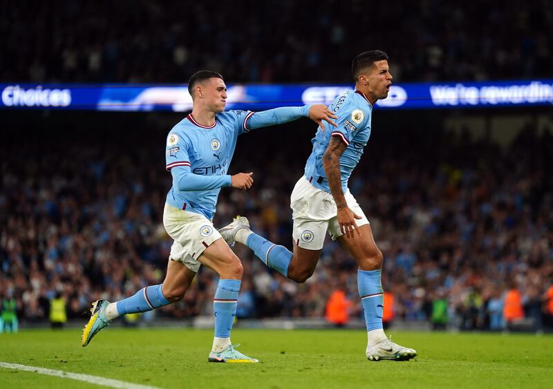 Manchester City's Joao Cancelo celebrates scoring the fourth goal. PA