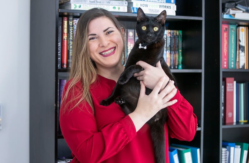 Chef Vanessa Bayma with her cat, Shadow. Ms Bayma says the best money she has spent was Dh7,000 on an injured kitten as she saved a life. Ruel Pableo for The National