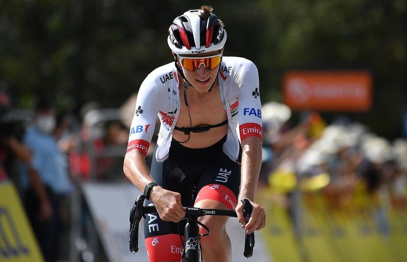 Tadej Pogacar crosses the finish line during the third stage of the Criterium du Dauphine. EPA