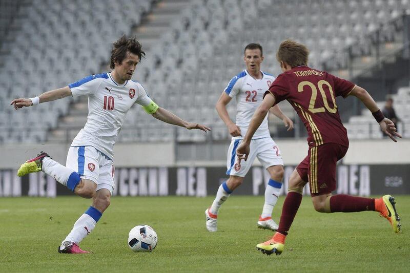 Tomas Rosicky, left, scored the equaliser for the Czech Republic against Russia on Wednesday night. Philipp Guelland / AFP

