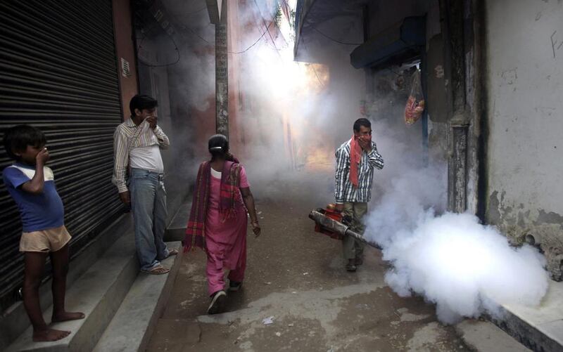 A reader calls on Indian authorities to do more to tackle dengue fever. Manish Swarup / AP