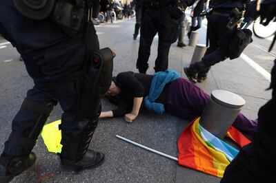 French police rush towards Genevieve Legay after she collapsed in Garibaldi Square during a rally in March 2019. AFP