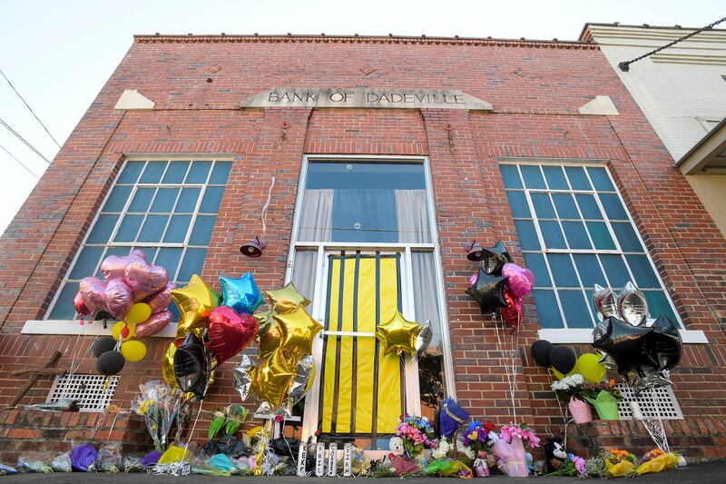 A makeshift memorial at the scene of the fatal shooting at a dance studio in Dadeville, Alabama. AP