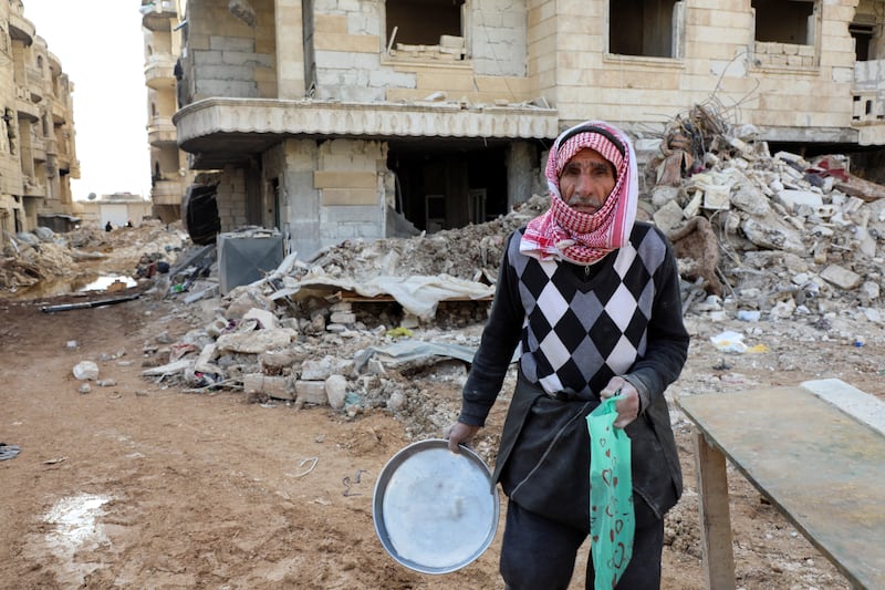 Ahmed Hussein outside his ruined home in the rebel-held town of Jandaris, Syria. Reuters