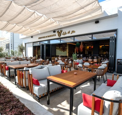 The outdoor seating area at Hunter & Barrel in Yas Bay. Victor Besa / The National